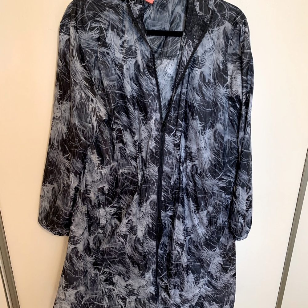 Black and white rain coat